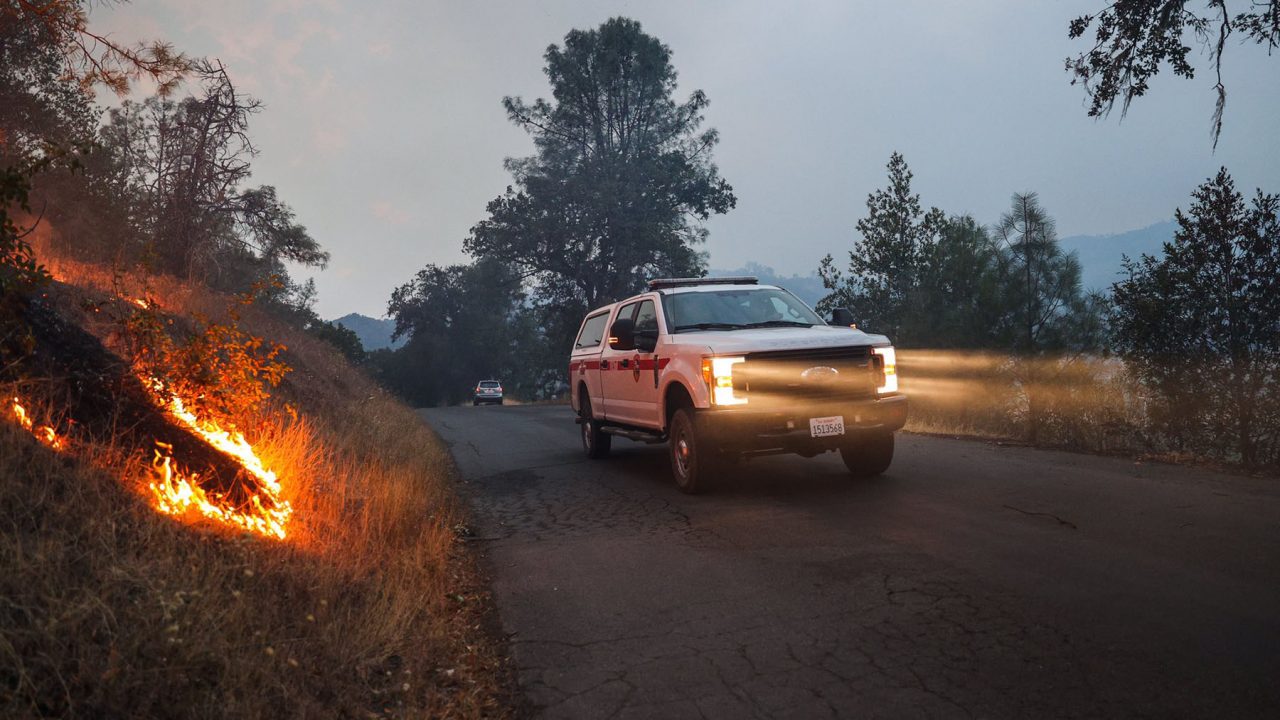 CalFire crews move through active fire zones as the Hennessy Fire burns in Napa County on August 18, 2020. Residents across the state are enduring withering heat and dozens of fires simulatneously. (Photo by Ethan Swope)